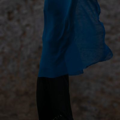 Abstract movement of fabric in a dark gym